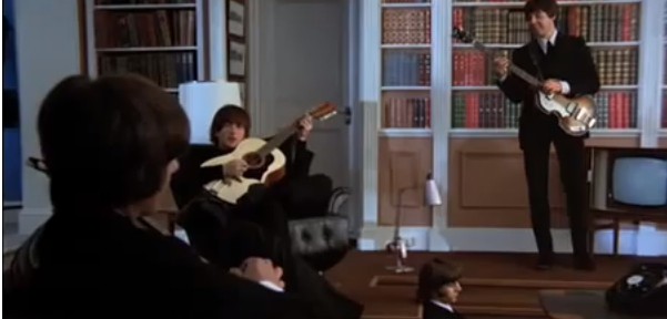 The Beatles sing in their movie house
